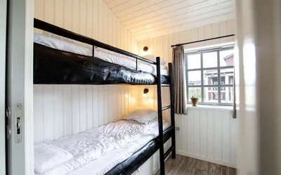 Hvidbjerg Strand Camping Resort Westernbyen Westernhytte Koejeseng